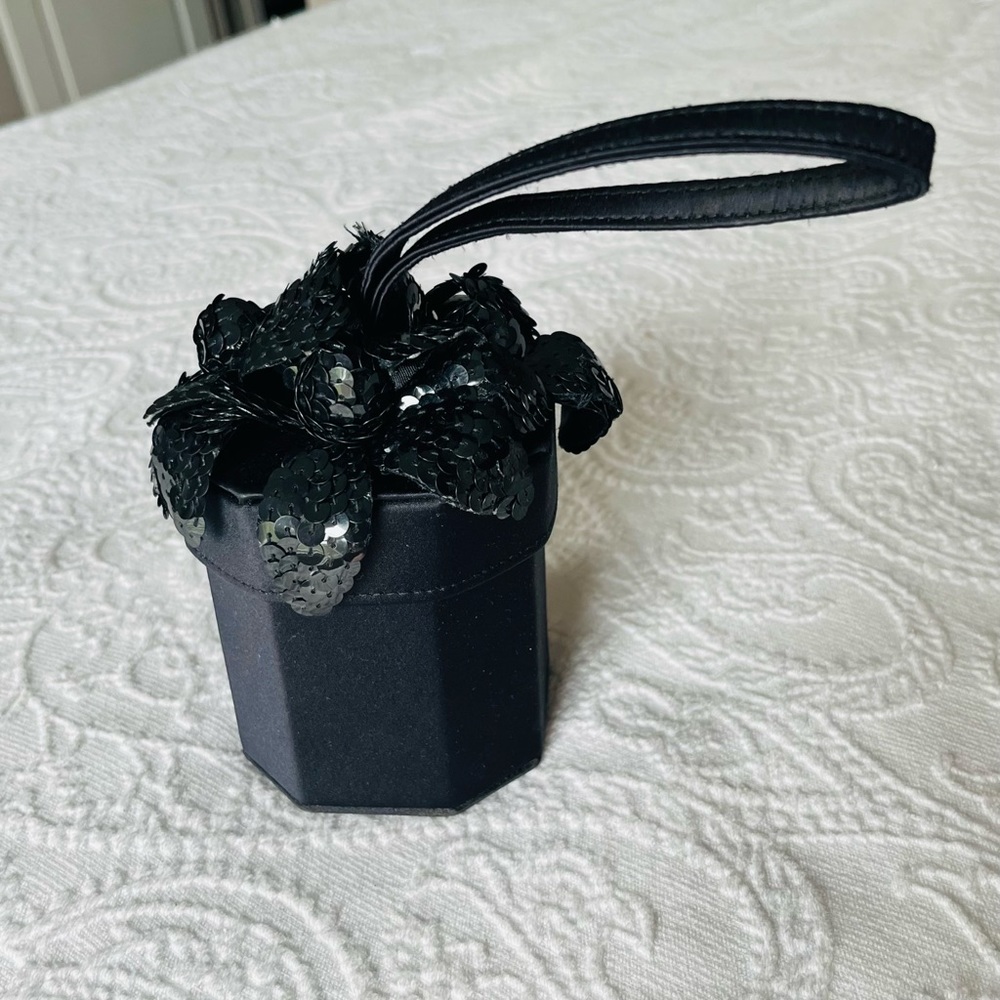 Lulu Guinness iconic black “flower pot” bag